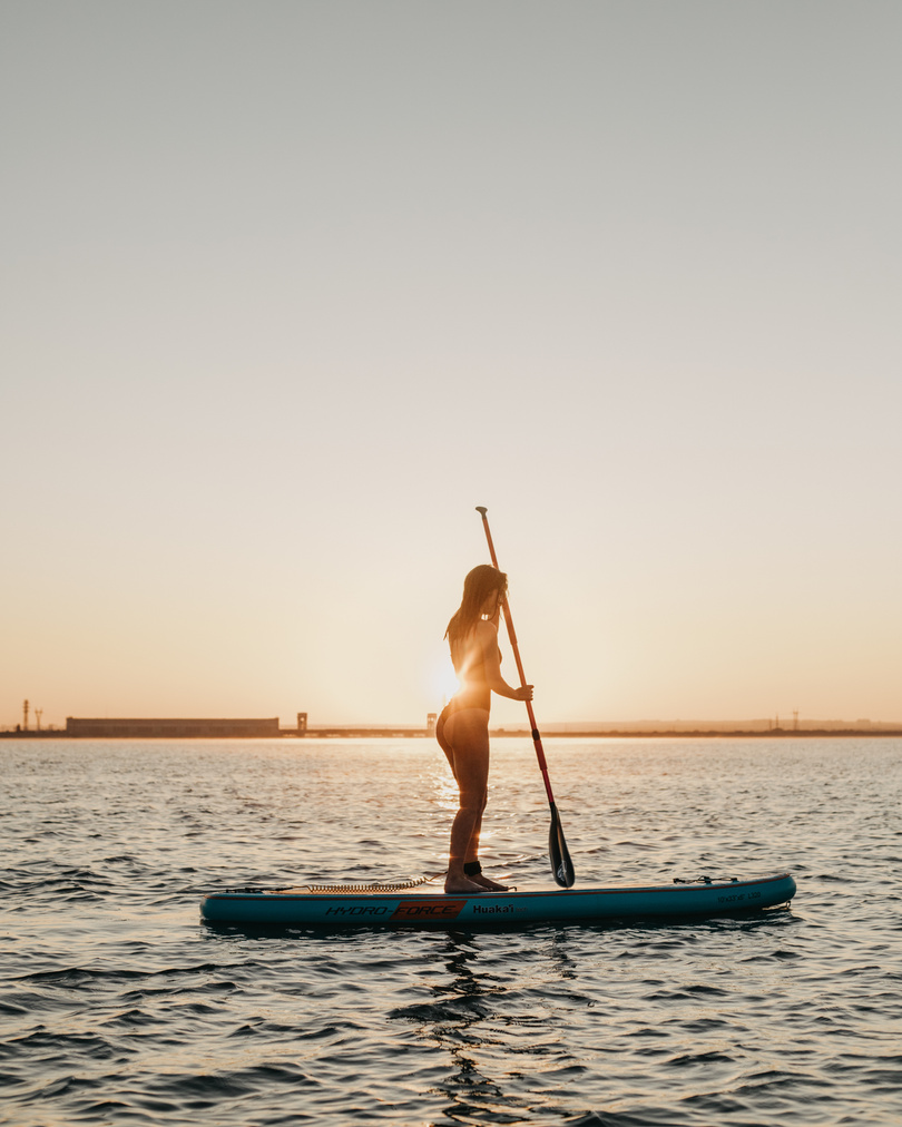  A Woman Paddleboarding